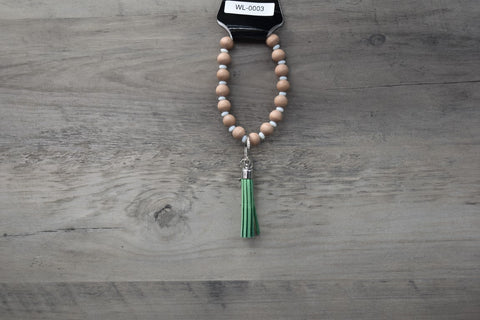 Brown with green tassel